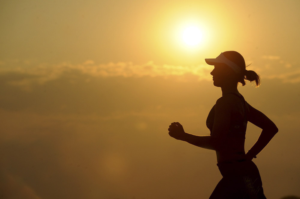 Silhouette of woman running